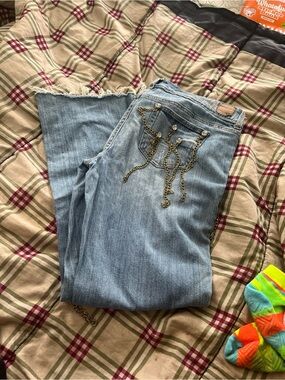 American Eagle Outfitters Light Blue Flared Jeans with Gold Chain Accent
